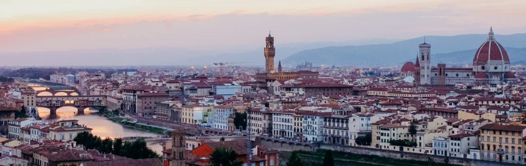 eloping in italy at Piazzale Michelangelo during sunset