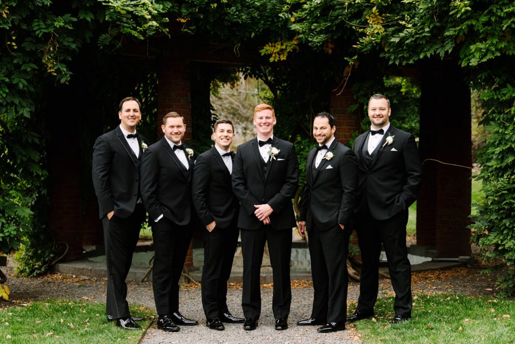 groom and groomsmen portrait at turner hill mansion captured by massachusetts wedding photographer Meghan Lynch