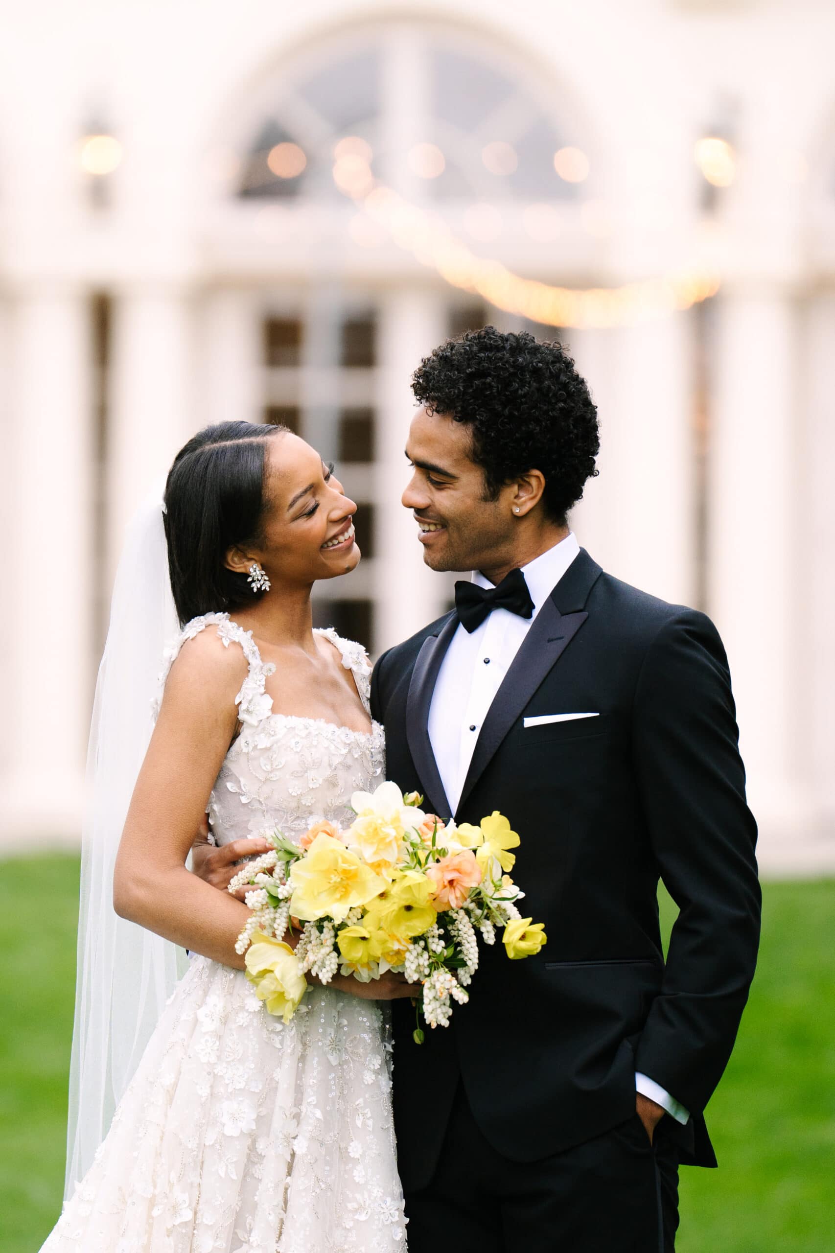 bride and groom close up portrait smiling and looking at each other during their wadsworth mansion wedding