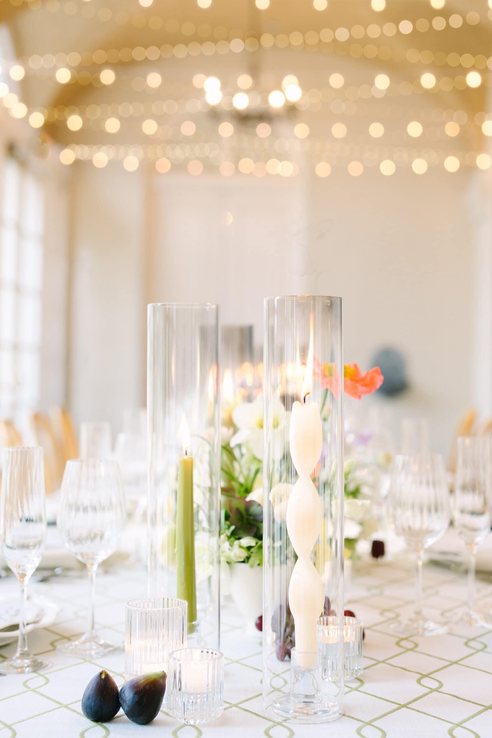 close up of candles and glassware at a reception table at a wadsworth mansion wedding