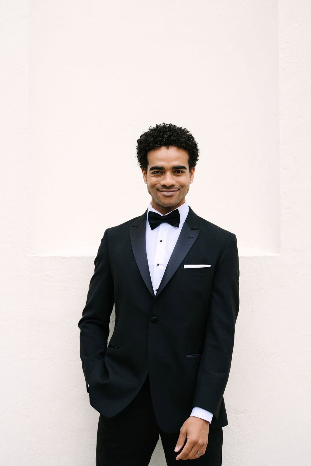 close up of a groom portrait during a black tie wedding at the wadsworth mansion