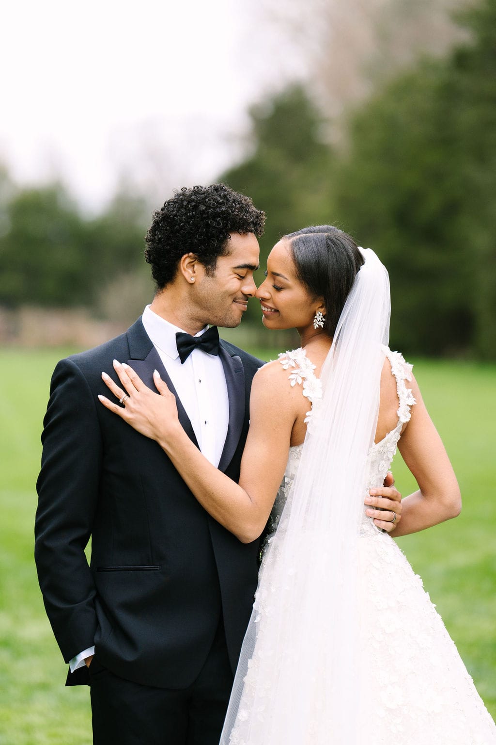 close up portrait of bride and groom with nose's touching at their wadsworth mansion wedding