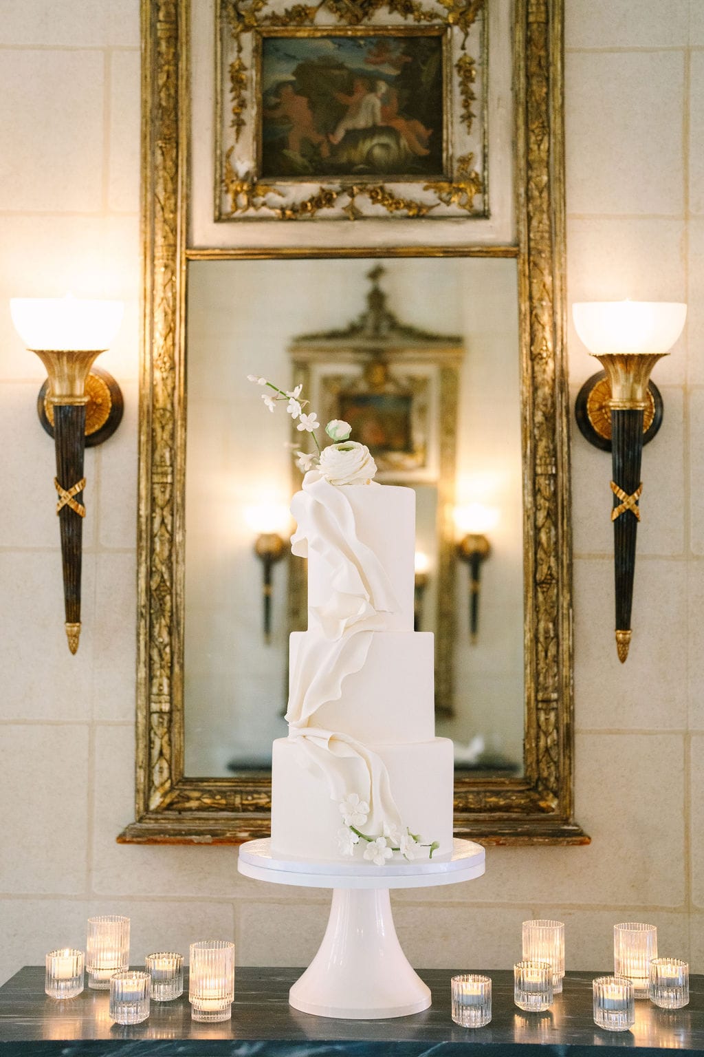 vertical shot of entire wedding cake during a wadsworth mansion wedding in connecticut