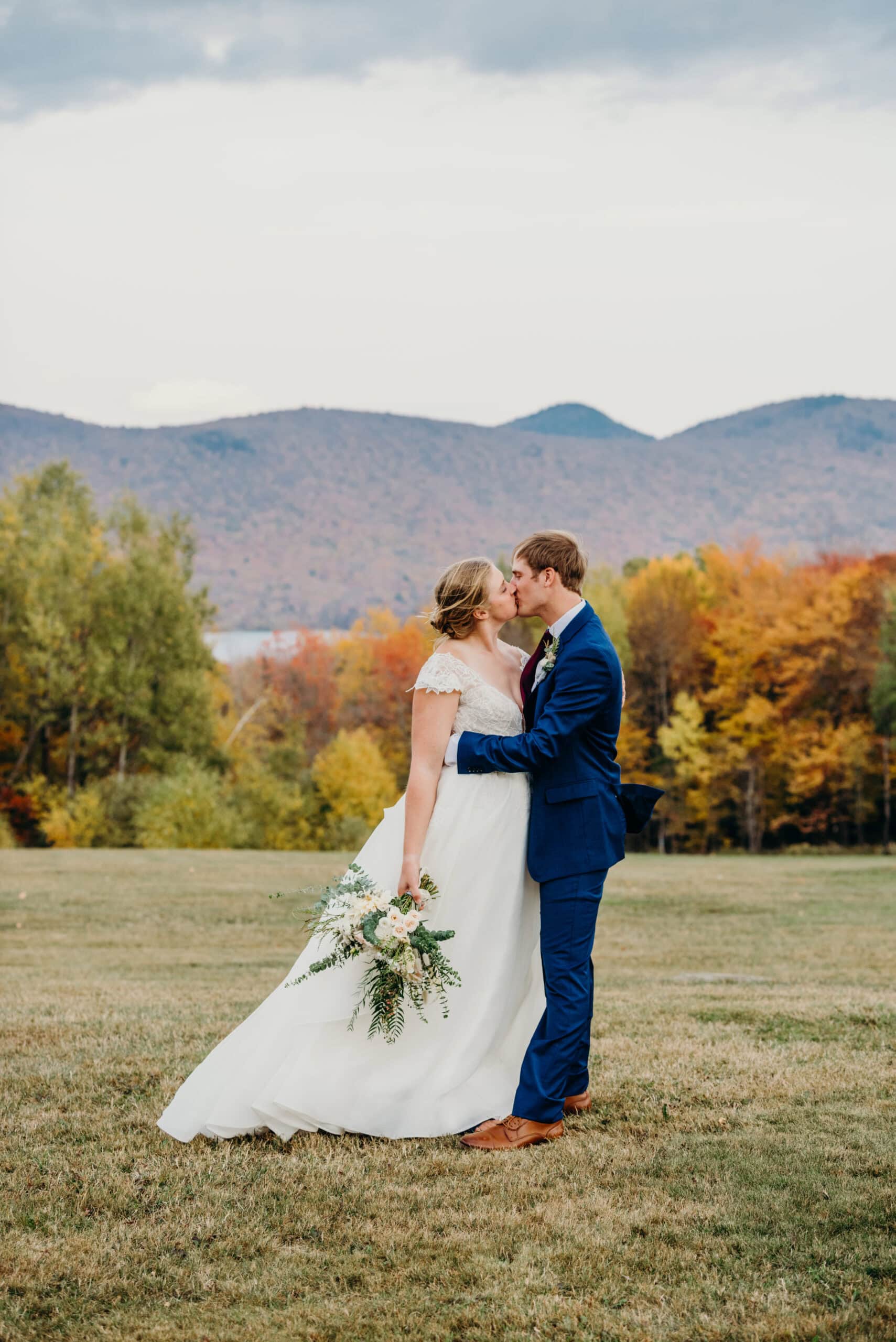 bride and groom kissing during their vermont elopement at the mountain top resort